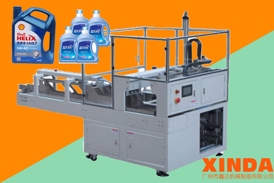 洗衣液定制型裝箱機(jī)_桶裝潤(rùn)滑油裝箱機(jī)(跌落式)-廣州鑫達(dá)機(jī)械